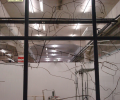 06 RADIOGRAFIA -Exploração para a Construção de um Retrato Sonoro / Guimarâes 2012 - Fábrica Asa - Intalação Dimensões variáveis- Tinta da china sobre vidro